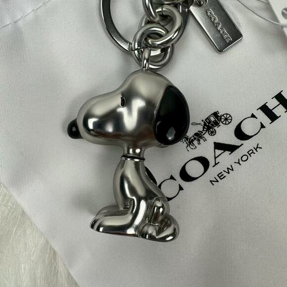 Coach X Peanuts Snoopy Bag Charm In Silver CBH28 with Dust Bag NWT - Picture 2 of 4